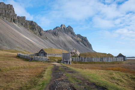 The Viking village near Vestrahorn mountain in southeast Iceland on a sunny autumn dayの写真素材