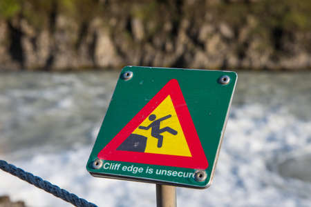 Warning sign at Gullfoss waterfall in South Icelandの写真素材