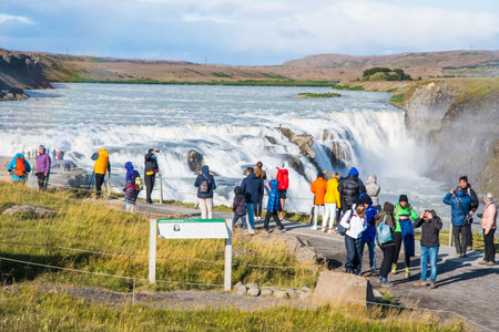 Gullfoss Iceland - August 10. 2019: Tourists watching the Gullfoss waterfall