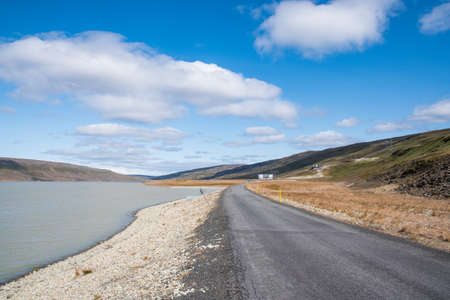 Coast of Sultartangalon Reservoir and Budarhals Hydroelectric power plant in Iceland on a sunny summer dayの写真素材