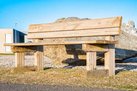 Wooden bench along the walking path in Icelandの写真素材