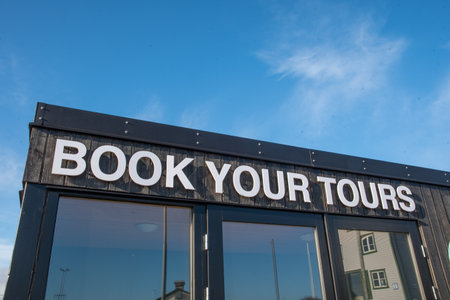 Hofn i Hornafirdi Iceland - April 16. 2020: Hofn i Hornafirdi Iceland - April 16. 2020: Dyngja travel booking office in townのeditorial素材