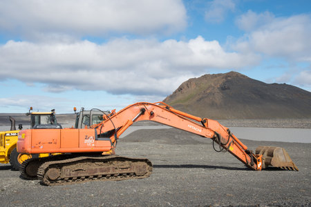 Karahnjukar Iceland - August 8. 2020: Hitachi excavator in the highlands of Iceland