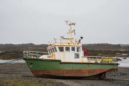 Reykholar Iceland - July 5. 2021: Boat aground on the beachのeditorial素材
