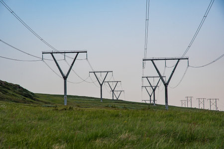 Power lines in the landscape of Reydarfjordur in east Iceland