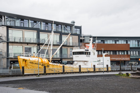 Reykjavik Iceland - May 29. 2021: Old Icelandic fishing boat in front of the Reykjavik maritime...