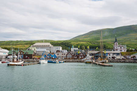 Husavik Iceland - July 15. 2021: Whale watching boats in the port of Husavik in North Icelandのeditorial素材