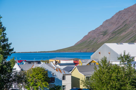 Town of Siglufjordur in North Iceland on a sunny summer dayの写真素材