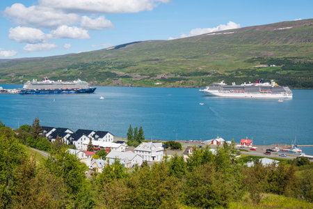 Akureyri Iceland - July 15. 2022: Cruise ships Carnival Pride and Mein Schiff 4 at port of Akureyriのeditorial素材