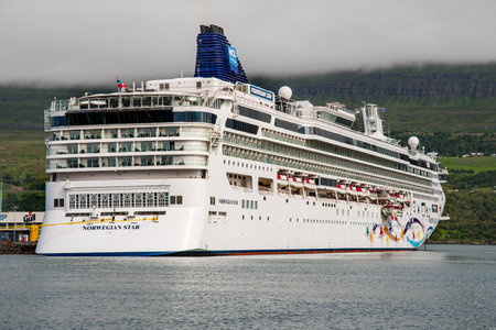 Akureyri Iceland - July 22. 2022: Cruise ship Norwegian Star in port of Akureyri in North Icelandのeditorial素材