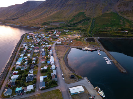 Evening aerial shot of village of Flateyri in the Westfjords of Icelandの写真素材