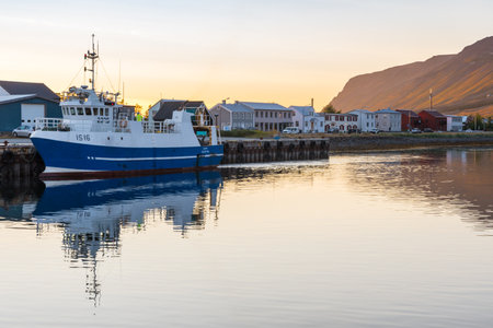 Flateyri Iceland, August 24. 2024: sunset above the town and portのeditorial素材