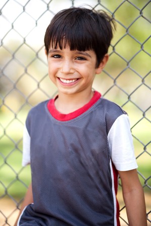 Portrait of happy boy laughing in front of cameraの写真素材