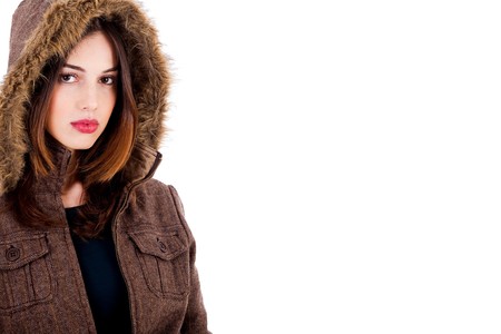 fashionable young lady wearing overcoat on an isolated backgroundの写真素材