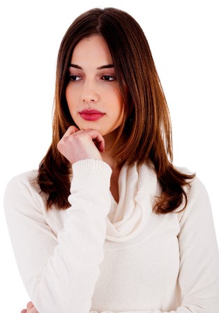 portrait of young woman looking depressed on an isolated backgroundの写真素材