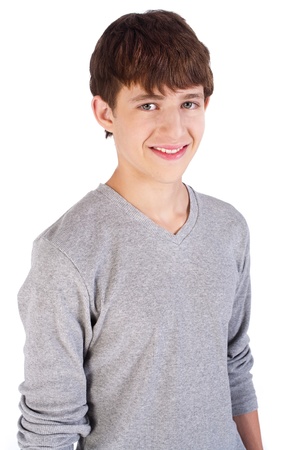 Adorable handsome young boy posing and smiling at camera. Adorable handsome young boy posing and smiling at camera.