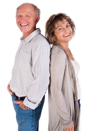 attractive loving couple posing back to back.の写真素材