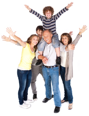 Happy family of four with young kid isolated on white background..の写真素材
