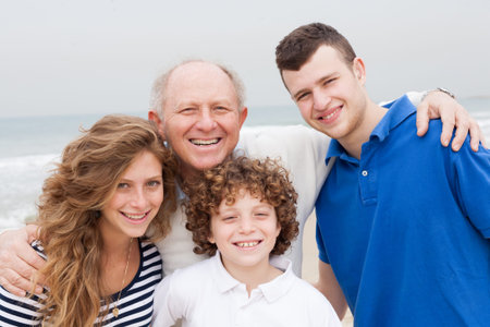 Three generation family on beach holiday