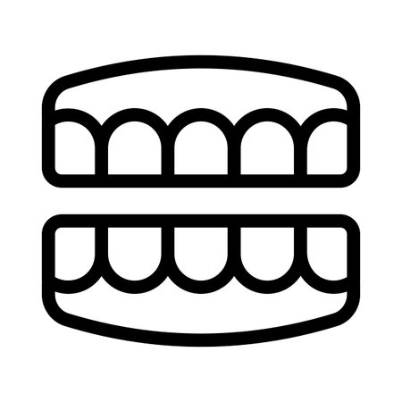 Artificial teeth set also known as denture isolated on a white backgroundのイラスト素材