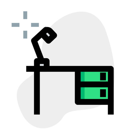 Compact size study table with desk-lamp.のイラスト素材