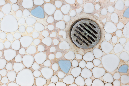 close up hairline on the waste water  mosaic tiles stone backgroundの写真素材