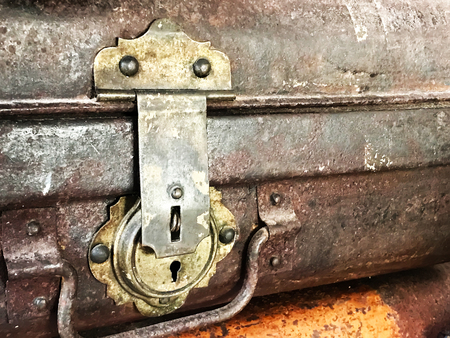 antique key lock on luggage made from brassの写真素材