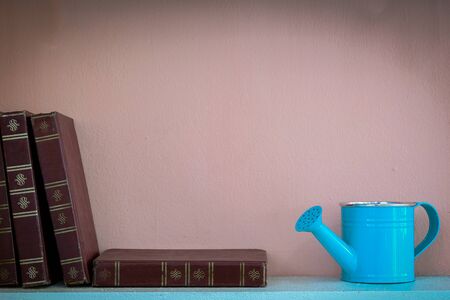 old book vintage on the shelf with water showerの写真素材