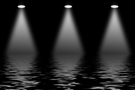 Projector spotlight with reflection in water.の写真素材