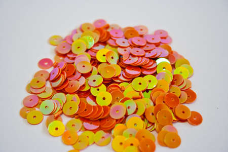 Orange sequinsの写真素材