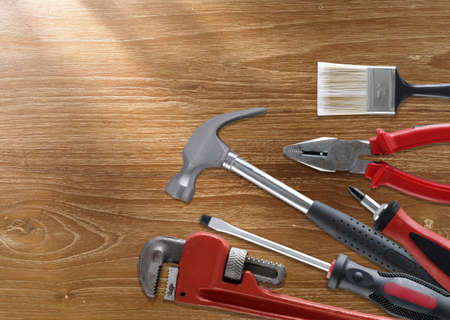 Set of tools on woodの写真素材
