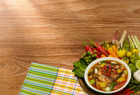 Thai style food Red curry cook with Asian Redtail Catfish and herb  の写真素材