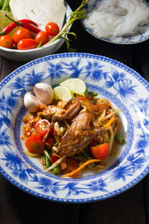 Famous Thai food,  spicy papaya salad with salted crab and fermented fish : somtumの写真素材