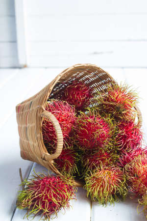 Rambutan in basketの写真素材