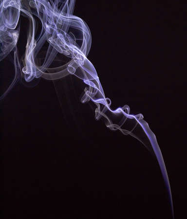 Smokes on black backgroundの写真素材