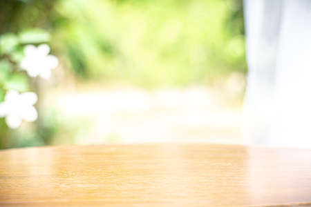 Wood table top on natural blurred backgroundの写真素材