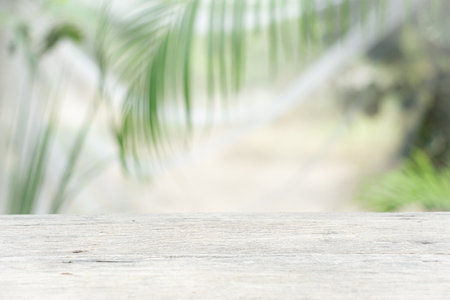 Wooden table on nature garden background for presentation productの写真素材