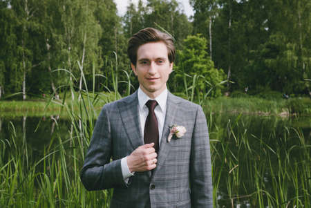 A man in a wedding dress suitの写真素材