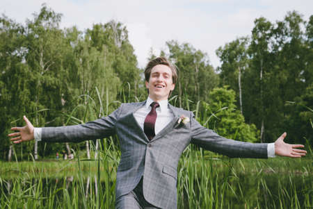 A man in a wedding dress suitの写真素材