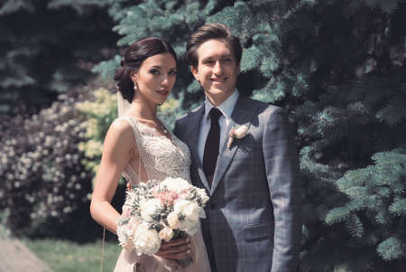 Wedding tour of the bride and groom in the forestの写真素材