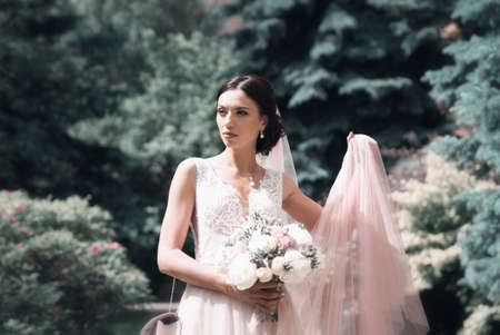 Wedding tour of the bride and groom in the forestの写真素材