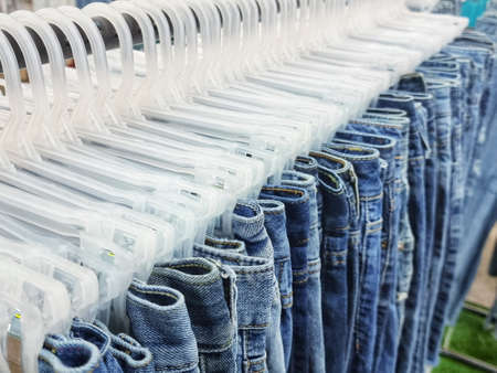 Hatyai-Thailand. October 26, 2021. Second-hand clothes are neatly folded and hung at a market in Thailandの写真素材