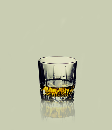glass of whiskey isolatedの写真素材