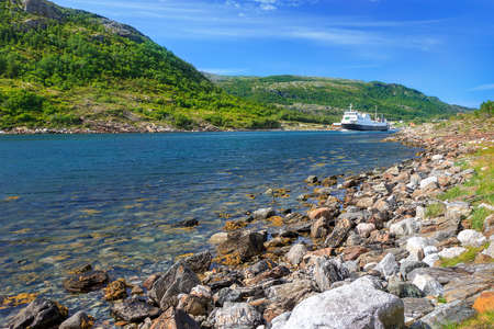 A ferry in the norwegian fjord