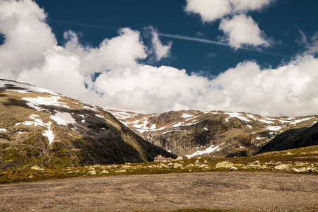 Tundra mountain landscape covered by snow fields in summer,  Norwayの写真素材