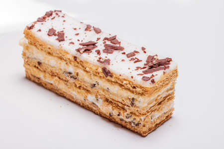 Stracciatella cake with chocolate curls on topの写真素材