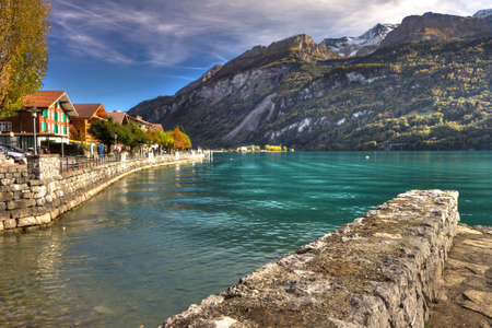 The promanade in the Town Brienz surrounded by Swiss Alps in autumn beautiful weather, Bernese Highlands, Switzerland, HDRの写真素材