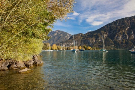 Lake Brienz with yachts in autumn beautiful weather, Bernese Highlands, Switzerland, HDRの写真素材