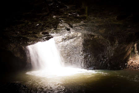 Waterfall under the Natural Bridge, Springbrook National Park, Gold Coast, Australia