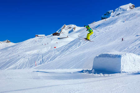 HOCH YBRIG, SWITZERLAND - February 26, 2015 - Flying skier skiing in Hoch-Ybrig mountain resort, Switzerlandのeditorial素材